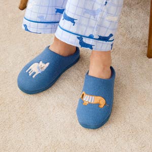 https://s3-ap-southeast-2.amazonaws.com/fusionfactory.commerceconnect.bbnt.production/pim_media/000/190/149/M_F_W25_Studio_LS_Flannelette_Shot_64_Max_Novelty_Slippers_129_SI.jpg?1740698853